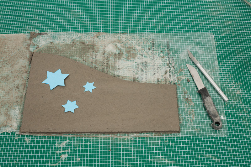 Windlicht aus Knetbeton - Sterne auflegen