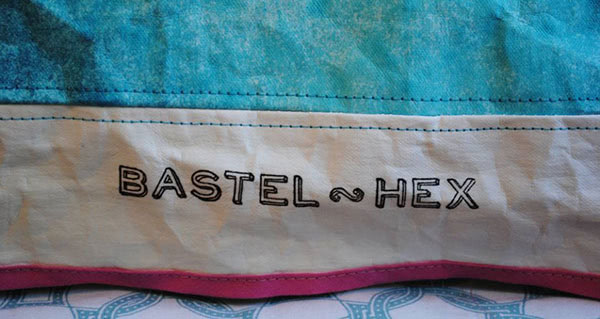 Schrägband umklappen und festnähen