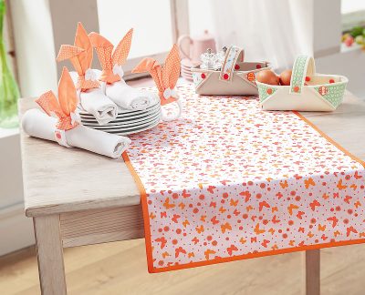 Körbchen mit Serviettenringen Körbchen mit Serviettenringen