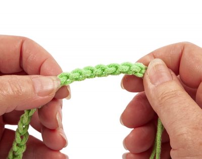 Loopschal mit Zopfmuster stricken - Schritt 3