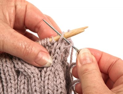 Loopschal mit Zopfmuster stricken - Schritt 35