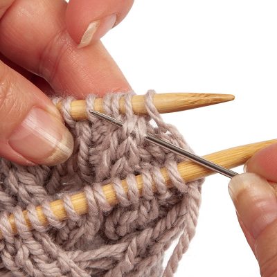 Loopschal mit Zopfmuster stricken - Schritt 39