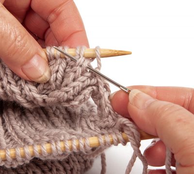 Loopschal mit Zopfmuster stricken - Schritt 42