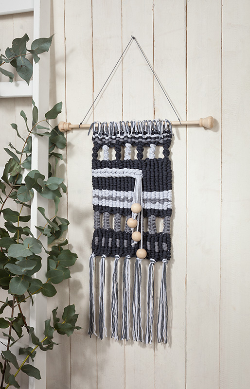 wandbehag-staebchenwebrahmen-schmuckbild