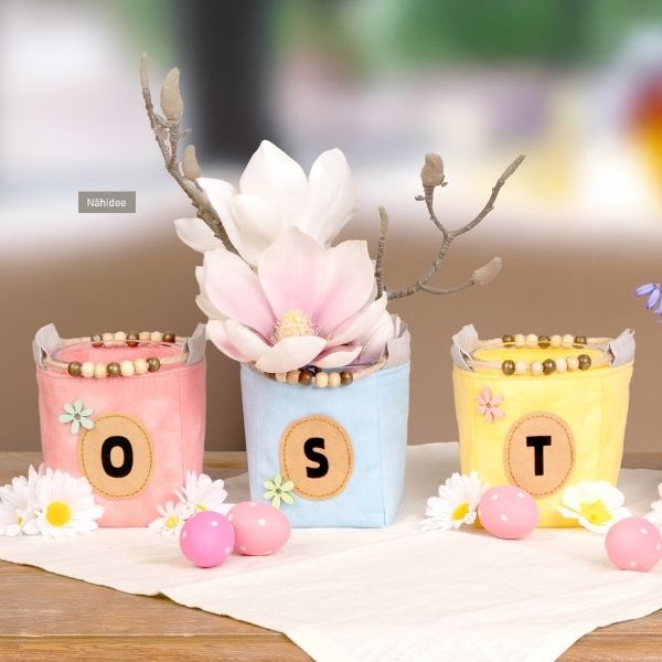 600px_button_schmuckbild_osterdeko_mit_blumentaeschchen